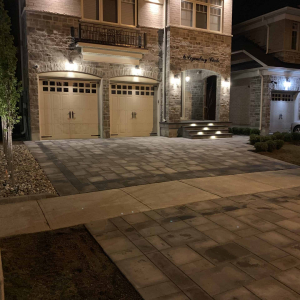 driveway with landscape lighting