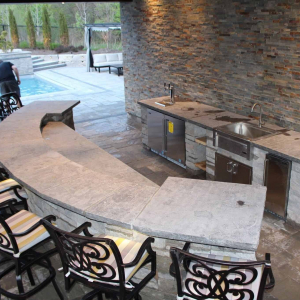 Rounded Bar With Outdoor Kitchen