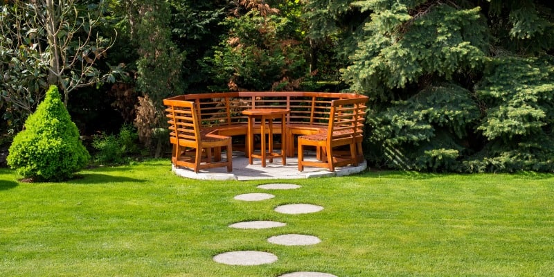 wooden bench table in backyard